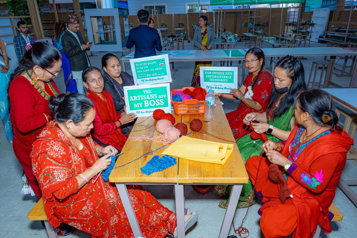 Artisans knitting woolen products Yes Helping Hand